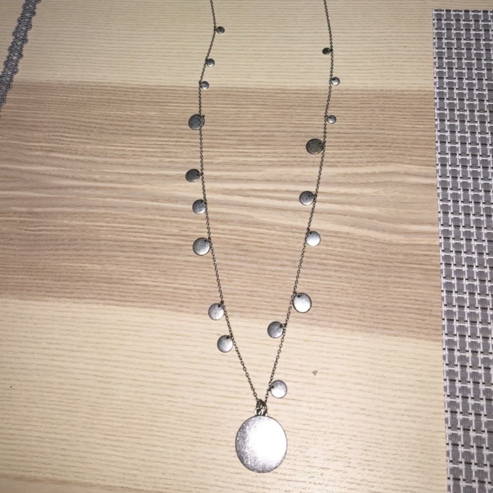 J Crew long silver metal necklace with circle